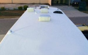 Fresh coat on the top of an RV.