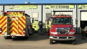 Two first responder vehicles at MPT Autobody for paint services